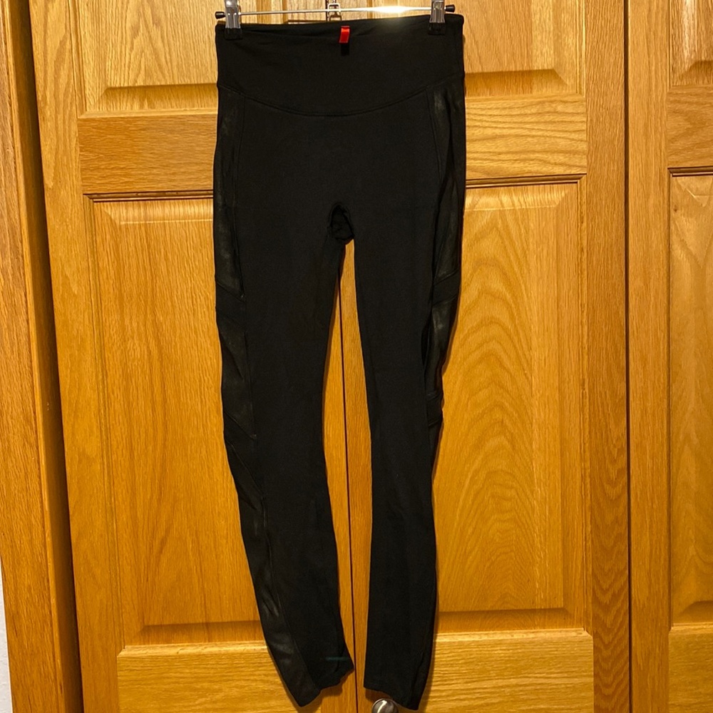 SPANX black leggings with faux leather accents down side of leg size small